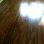 hardwood floor finished with antique brown stain