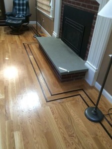 hardwood floors infront of fireplace