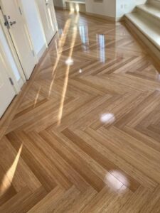 Herringbone bamboo flooring finished with one coat Bona Clear Seal and three coats Bona Traffic next to stairs
