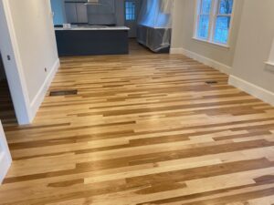 Hickory flooring finished with oil-based poly