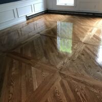 Custom installation. 2-inch white oak flooring with nutmeg stain. oil based polyurethane for finish