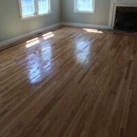 Red oak flooring installed with oil based polyurethane